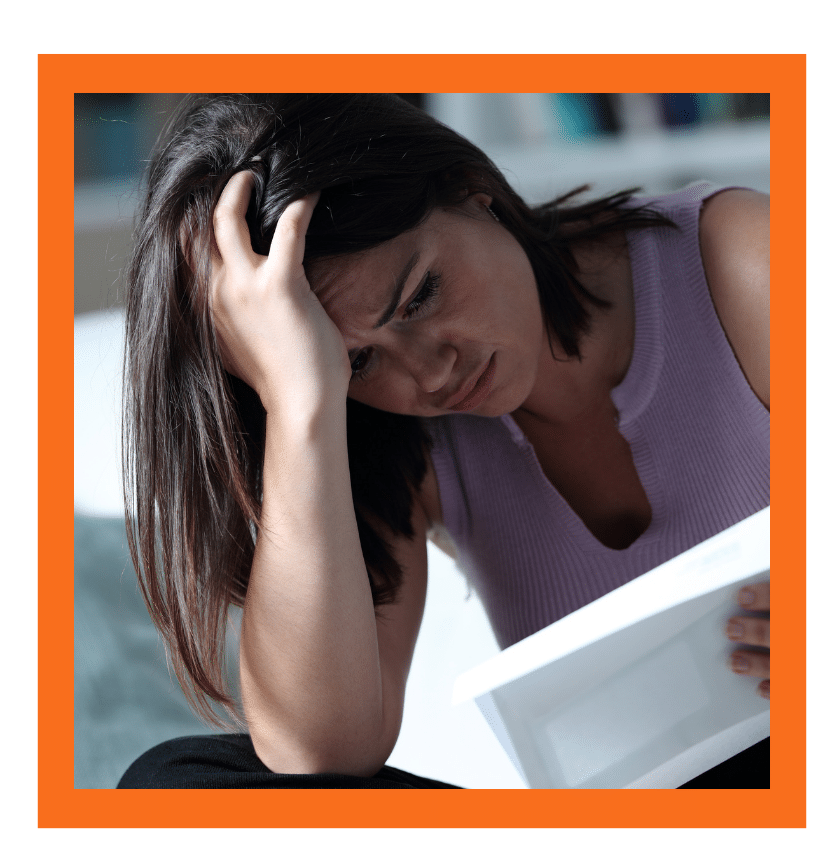 Distressed woman reading an important immigration notice