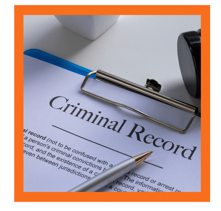 Criminal record form with pen and clipboard on a desk