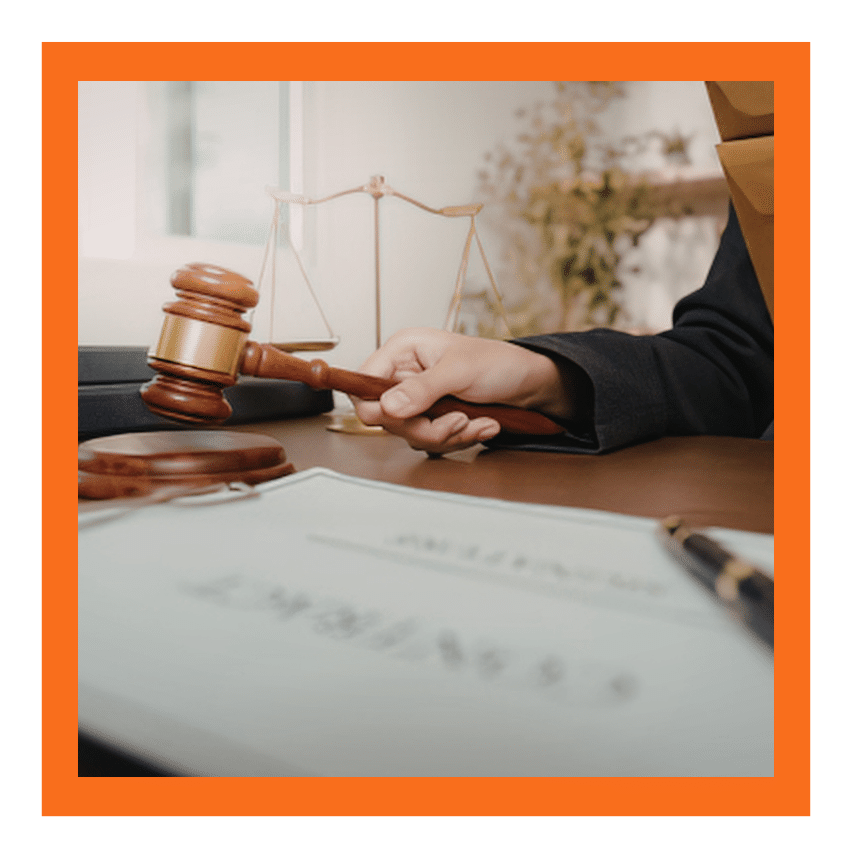 A calendar beside an alarm clock emphasizes the importance of tracking hearing dates and filing deadlines. Missing a scheduled immigration court appearance can lead to serious consequences.